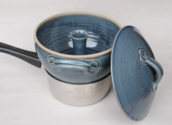 blue steamer on saucepan
